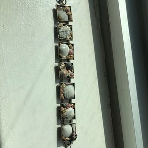 Seashell bracelet made in Puerto Rico on beach